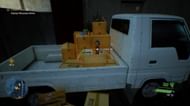 Players can find the Kokeshi Relic in the back of the truck next to the hospital (Image via Tango Gameworks)